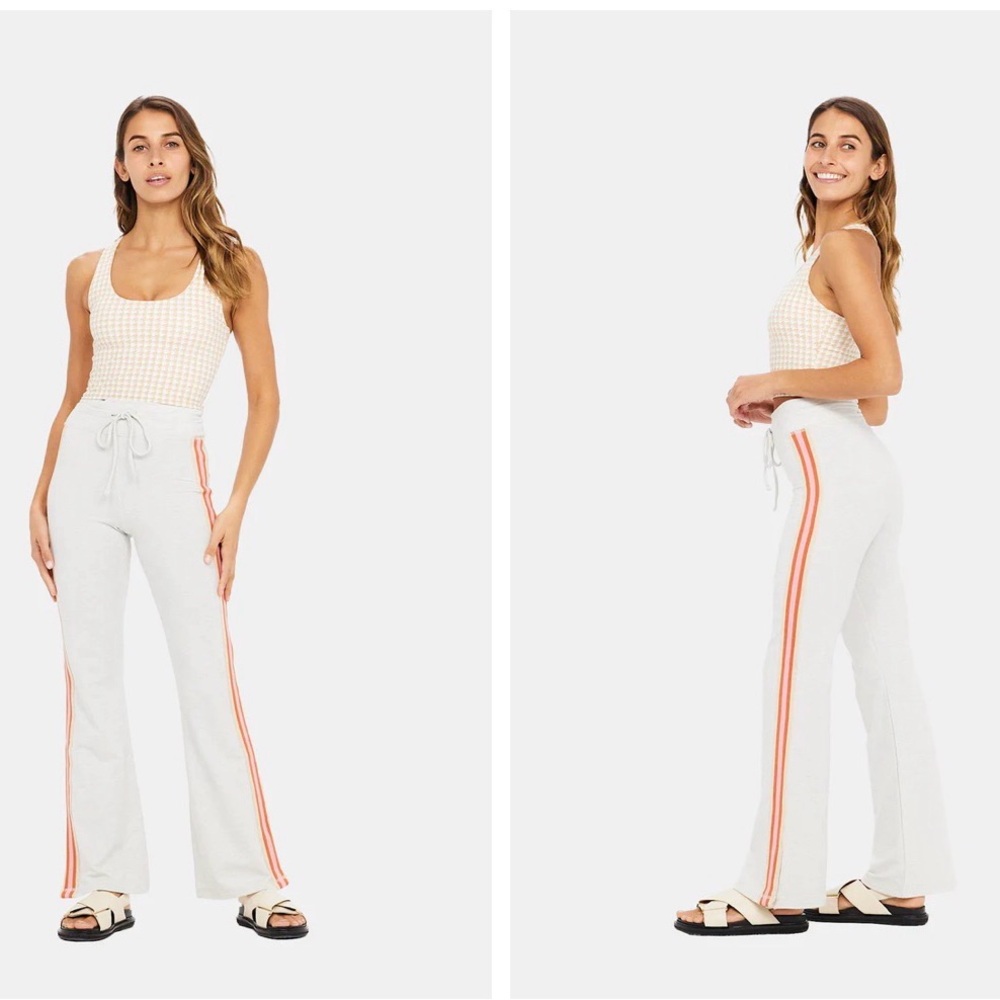 The Upside White Track Pants with Orange Side Stripes